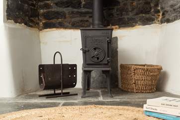 There is the sweetest little wood-burner in the snug