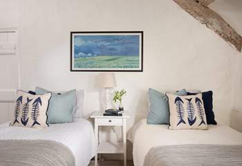 Bedroom 3 is set up with twin beds. 