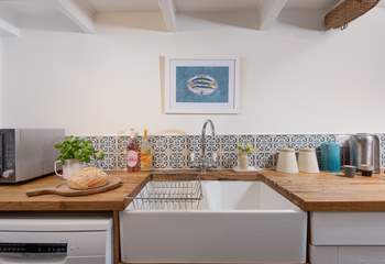 The kitchen has a proper country-style sink.