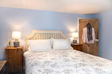 Pretty bedroom two also has a king-size bed.
