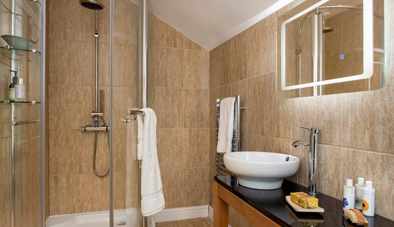 Bedroom one has an en suite shower-room.