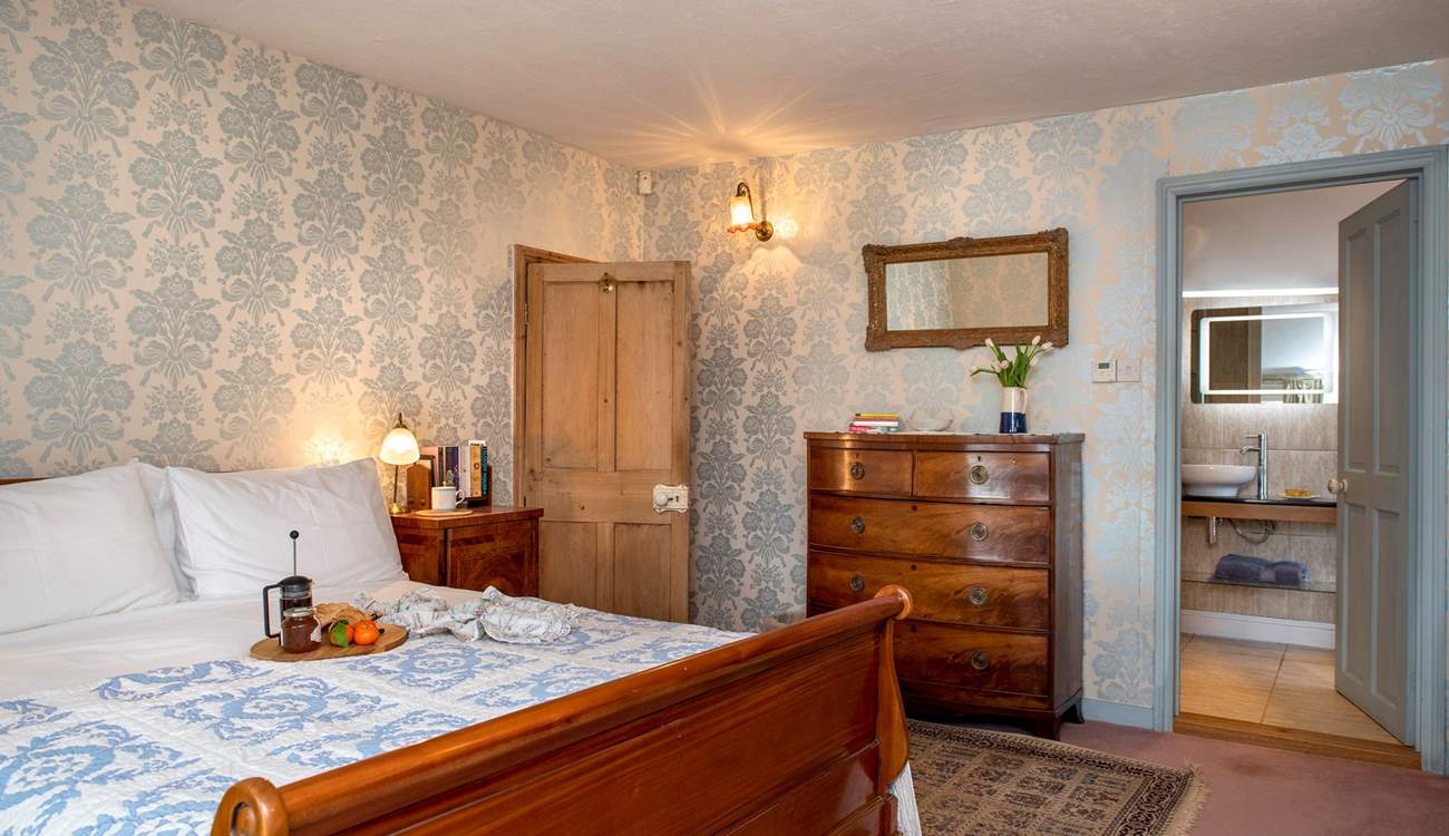 A king-size bed awaits you in bedroom one.