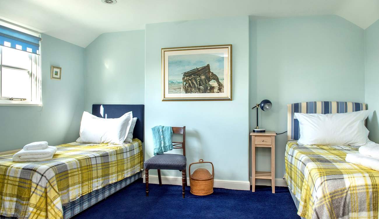 Bedroom four is a twin bedroom.