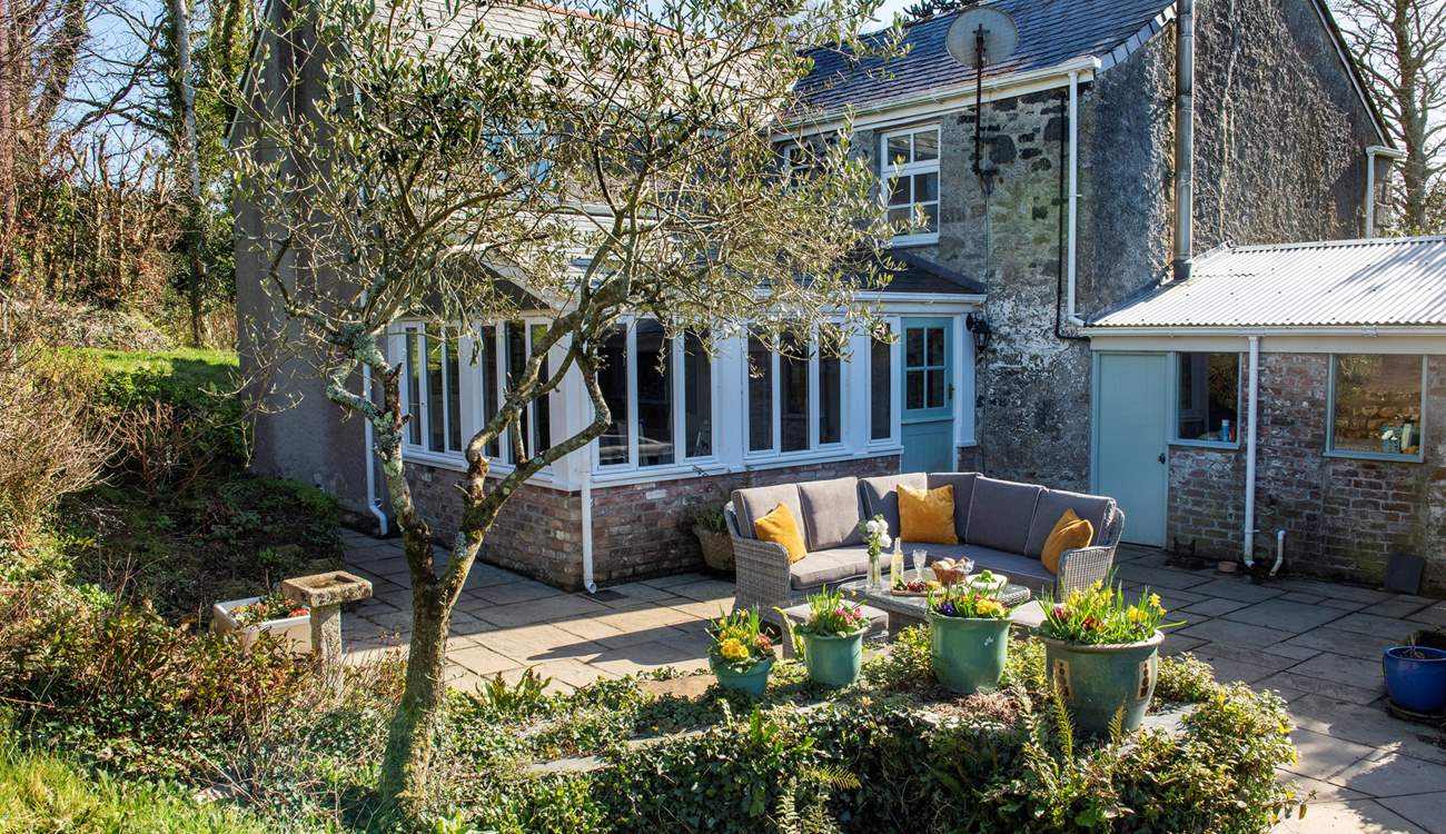 The sunny patio invites you to chill out and relax and enjoy this very special setting.