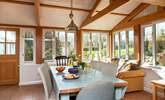 The dining-area really embraces the setting overlooking the garden. - Thumbnail Image