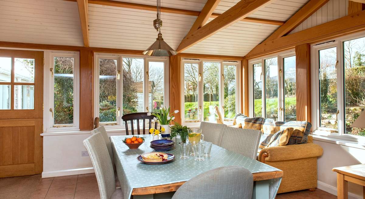 The dining-area really embraces the setting overlooking the garden.