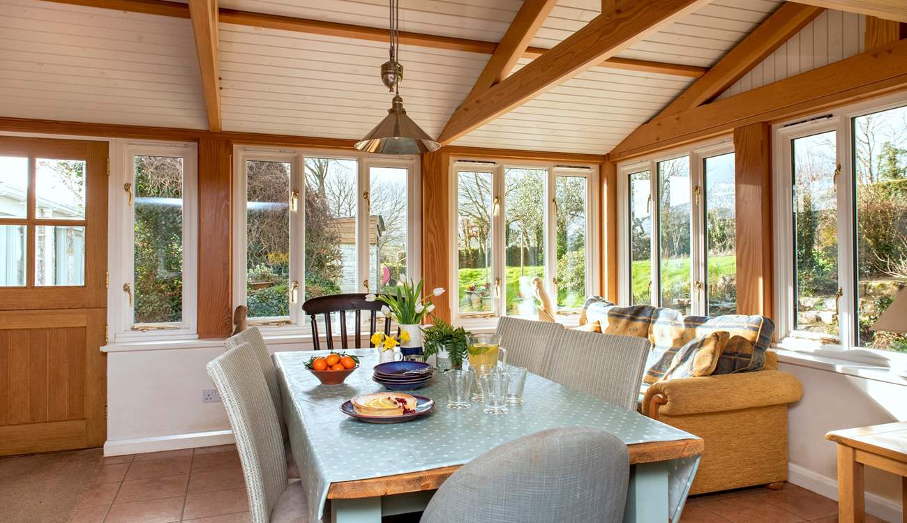 The dining-area really embraces the setting overlooking the garden.