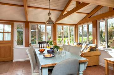 The dining-area really embraces the setting overlooking the garden.