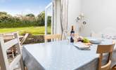 Patio doors lead out into the secluded back garden where you can catch the sun's rays all day. - Thumbnail Image