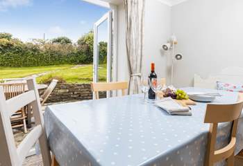 Patio doors lead out into the secluded back garden where you can catch the sun's rays all day.
