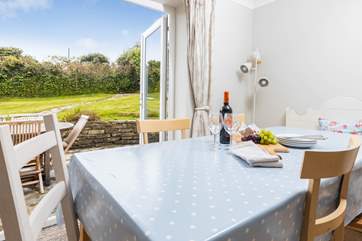 Patio doors lead out into the secluded back garden where you can catch the sun's rays all day.