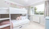 Children will love the cute bunk-room with a lower four-foot bed and three-foot bed above. - Thumbnail Image