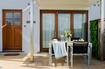 The pretty terrace is perfect for al fresco dining.
