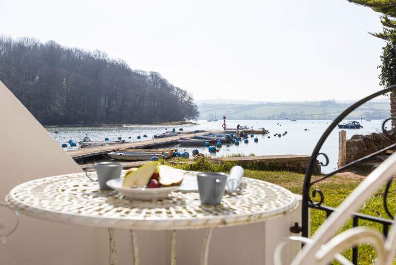 Watch the boats come and go on the river Dart from this idyllic spot.