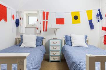 This room is perfect for larger families with twins and bunk-beds.