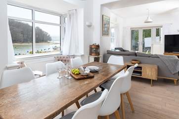 Watch the tide ebb and flow from the dining-table.