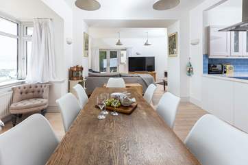 The gorgeous open plan L-shaped living space has oodles of room for everyone.