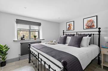 Bedroom 1 has a huge super-king size six-foot bed.