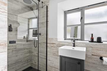 The en suite has a walk-in shower and rainfall shower.