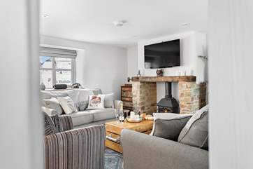 The gorgeous fireplace is a super feature of this room.