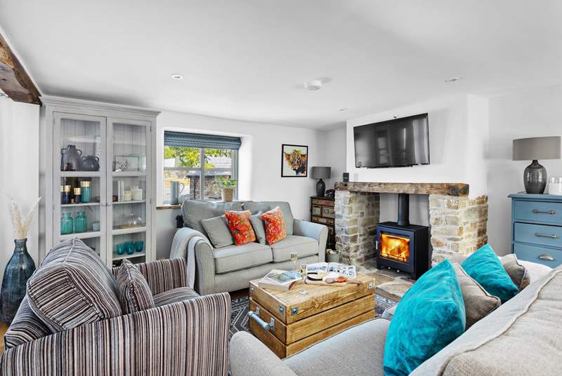 Relax in front of the wood-burner and watch a movie on the Smart TV.