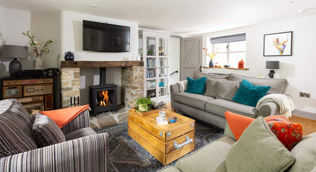 Relax in front of the wood-burner and watch a movie on the Smart TV.