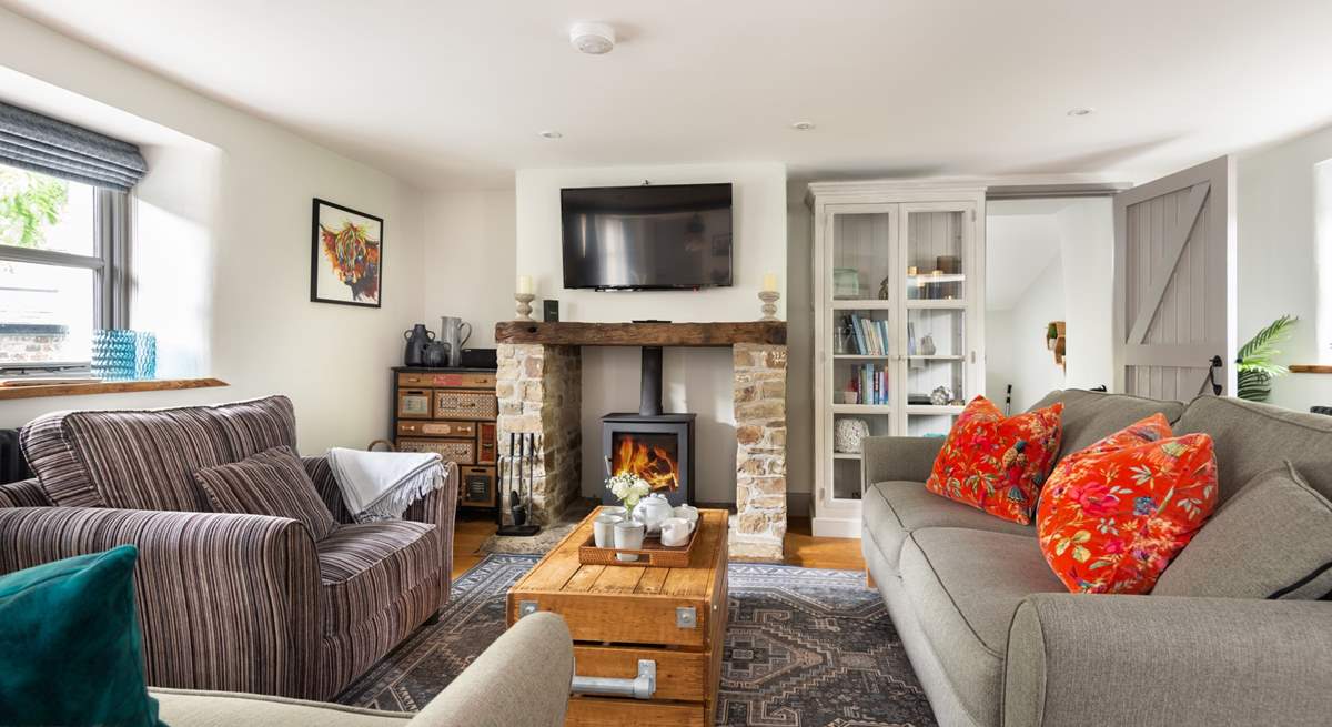 Relax in front of the wood-burner and watch a movie on the Smart TV.