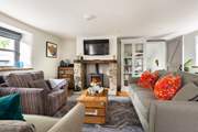 Relax in front of the wood-burner and watch a movie on the Smart TV.