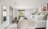 Bedroom 1 has a huge super-king size six-foot bed.  - Thumbnail Image