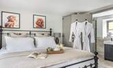 Bedroom 1 on the ground floor is elegantly furnished. - Thumbnail Image