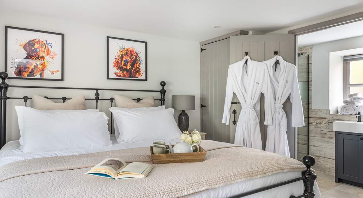 Bedroom 1 on the ground floor is elegantly furnished.