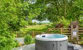 Take a dip in the hot tub surrounded by nature! - Thumbnail Image