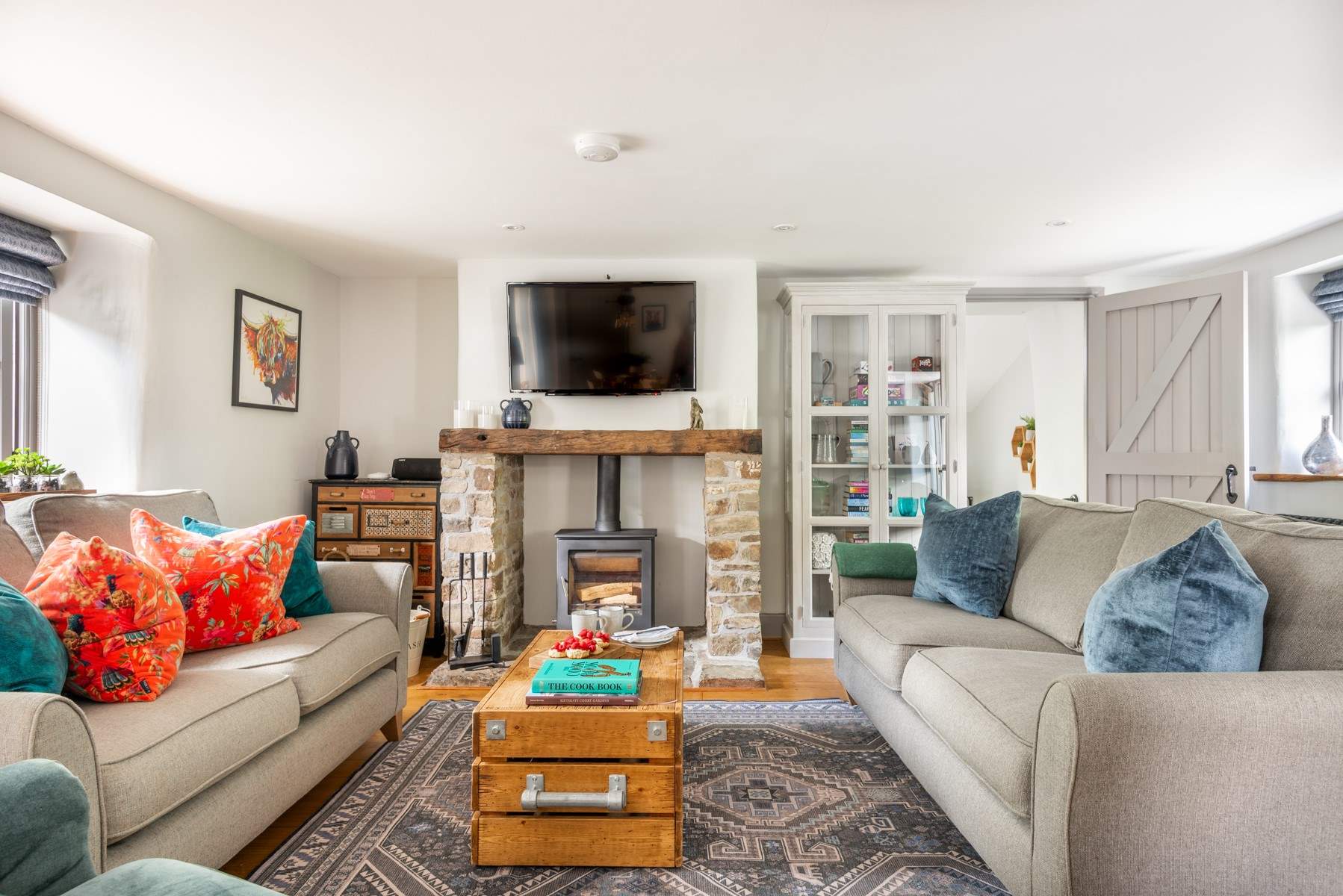 The cosy sitting-room has a wood-burner for those chillier evenings.