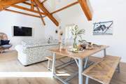 The open plan living space provides plenty of room for everyone.