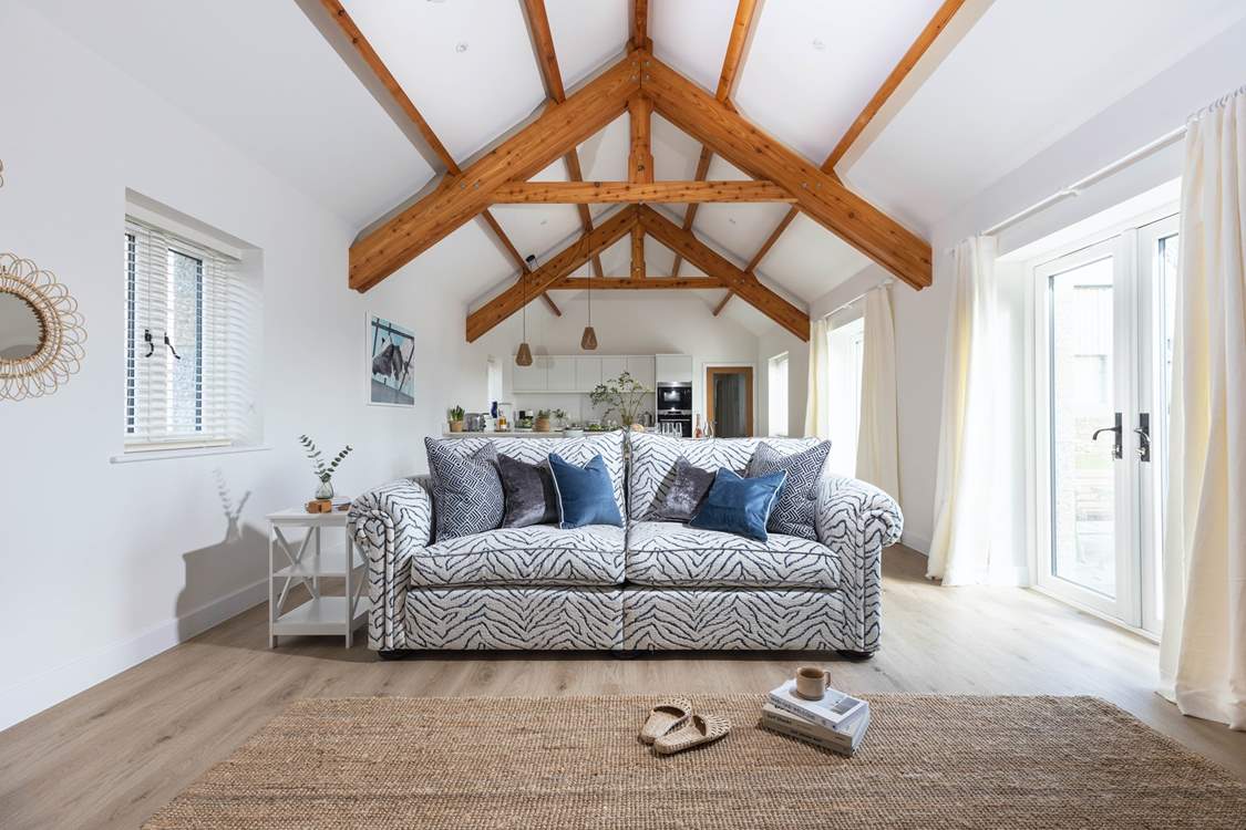 Snuggle up on the sofa or relax in an armchair after a day exploring.