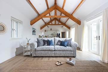 Snuggle up on the sofa or relax in an armchair after a day exploring.