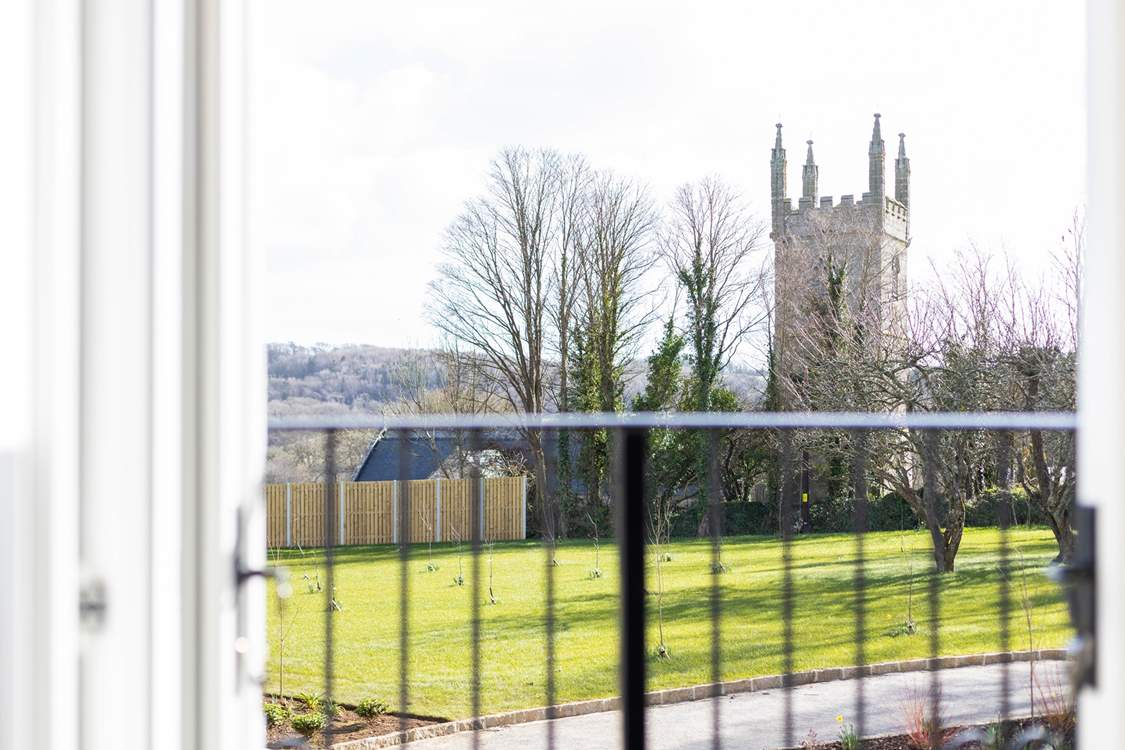 Double doors open from the first floor onto views of the pretty church and surrounding countryside.