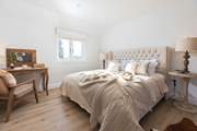 The luxurious principal bedroom oozes comfort with a fabulous super-king bed.