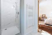 Rinse off your salty locks in the en suite shower-room.