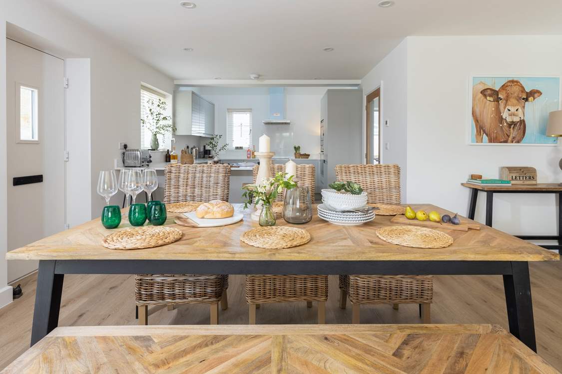 Pull up a chair and enjoy long meals around the table, planning your next day's adventure. The house also has charming art work by Amanda Hunt paying tribute to the cows.