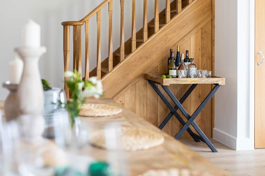Stunning hand-carved stairs lead to the three bedrooms and family bathroom.