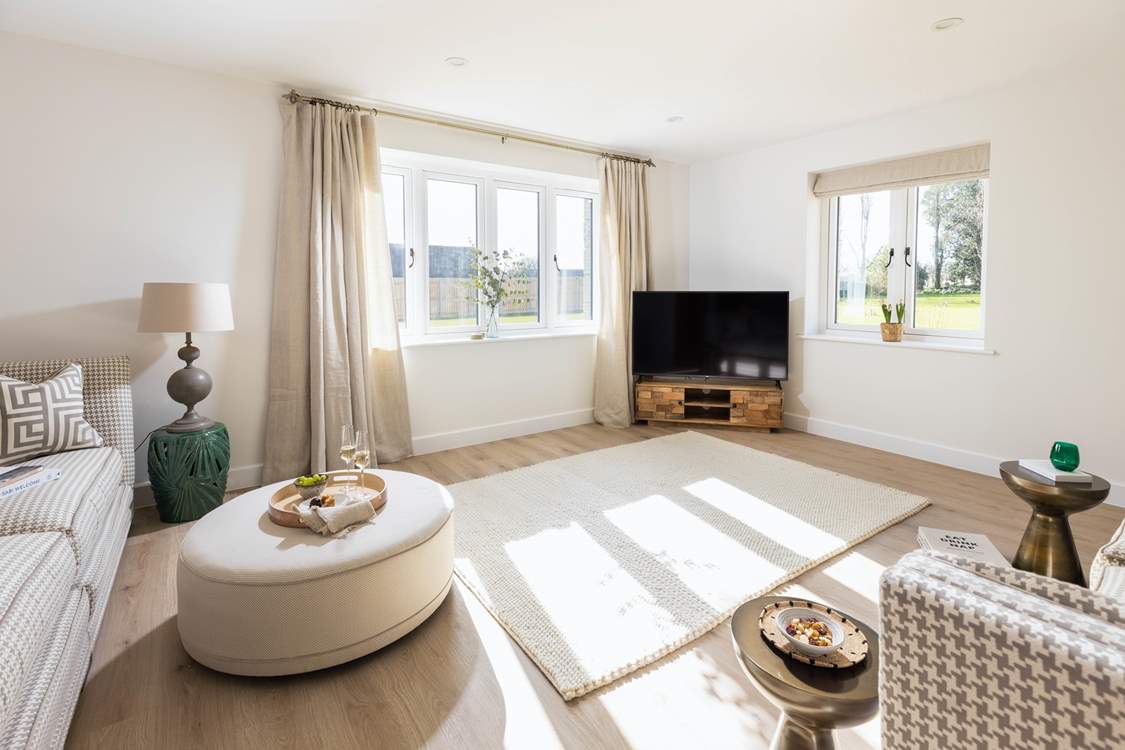 The light and bright sitting-area is charming but when you draw the hand-made linen curtains you will feel super snug.