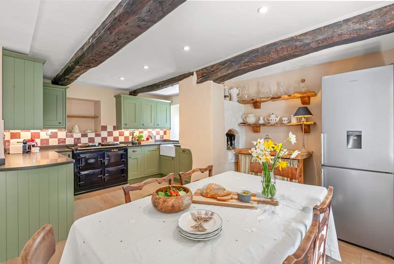 The characterful kitchen/diner is on the lower ground floor with access to the patio.