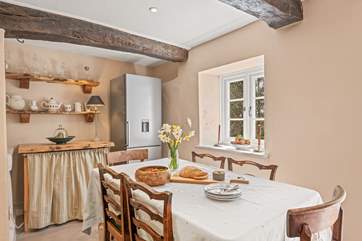The lower ground floor is home to the open plan living-room with kitchen/diner and sitting-area, perfect for sociable dining.