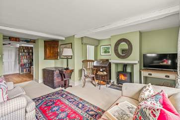 With oodles of character, the main sitting-room is cosy as can be throughout the year thanks to the gorgeous wood-burner.
