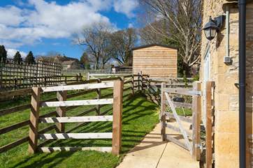 Step out from the living area to the secure garden, perfect for your four legged friend.
