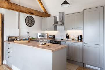 The beautiful kitchen has everything you need.