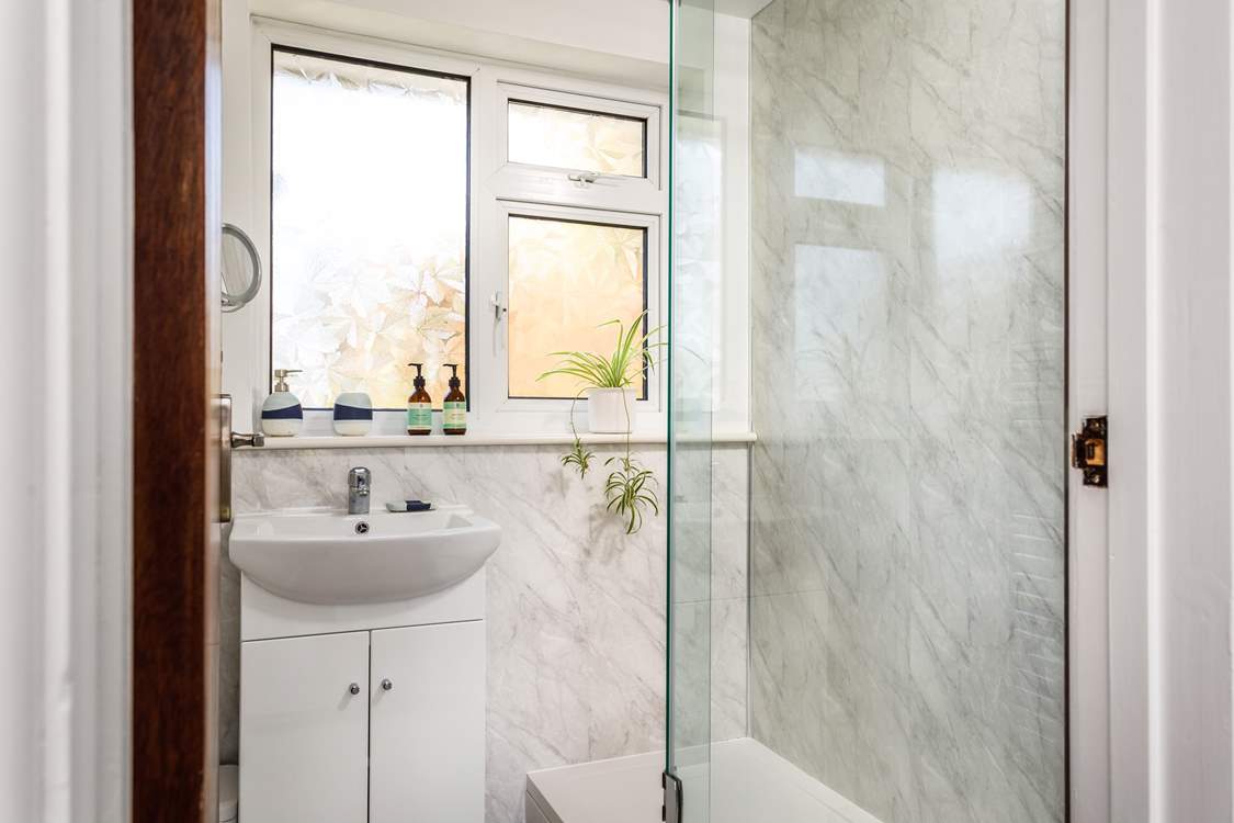 The shower is perfect for washing salty toes after a beach day.
