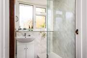 The shower is perfect for washing salty toes after a beach day.