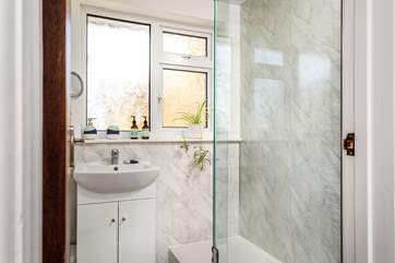 The shower is perfect for washing salty toes after a beach day.
